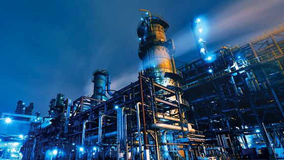 An oil refinery at night